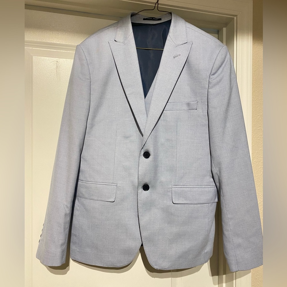 Moda Crise Mens Wear slim fit light blue two piece suit with jacket and vest.